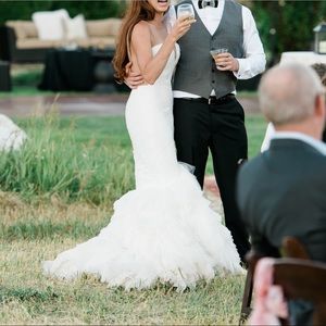 Oringally $4000, size 6-8. I’m 5’8” wore flip flops. Illusion neckline.